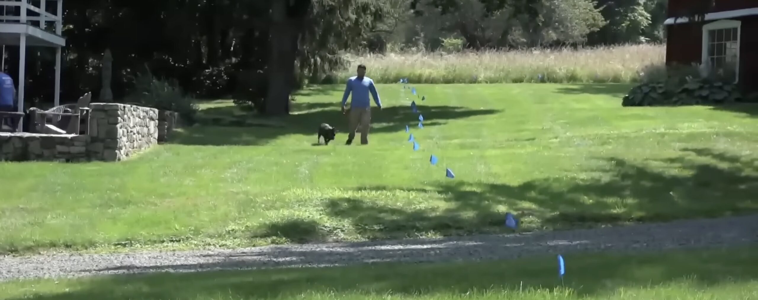Freedom Fence dog trainer marking the new underground dog fence boundary